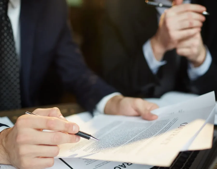 businessman-reading-contract_1098-14772